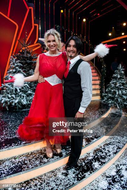 Winners Erich Klann and Magdalena Brzeska pose after the Final of 'Let's Dance - Let's Christmas' TV Show on December 21, 2013 in Cologne, Germany.