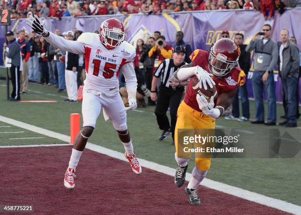 Josh Shaw of the USC Trojans intercepts a pass in the end zone that was intended for Davante Adams of the Fresno State Bulldogs during the Royal...