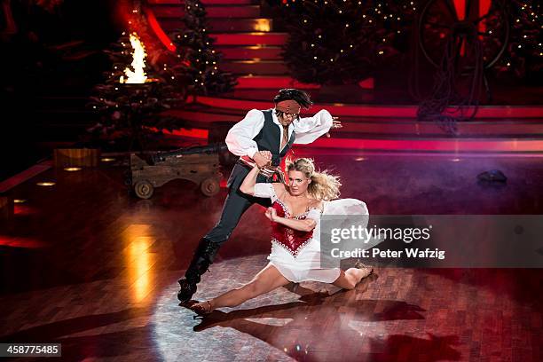 Erich Klann and Magdalena Brzeska perform during the Final of 'Let's Dance - Let's Christmas' TV Show on December 21, 2013 in Cologne, Germany.