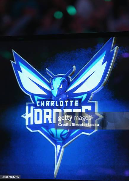 The Charlotte Bobcats unveil the new logo for next years team name change during their game at Time Warner Cable Arena on December 21, 2013 in...