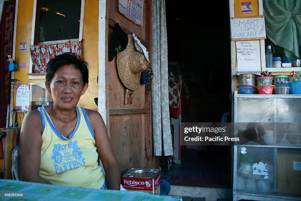 Marilyn Bandog, 55, a municipal health worker from San...