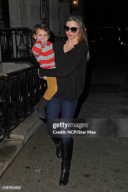 Model Miranda Kerr and son Flynn Bloom are seen on December 21, 2013 in New York City.