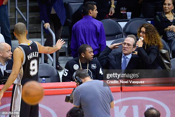 Tommy Lee Jones and his wife Dawn Laurel-Jones attend a basketball game between the San Antonio Spurs and the Los Angeles Clippers at Staples Center...