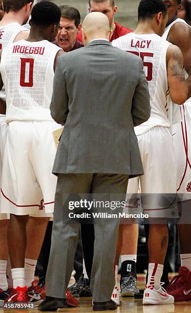 Head coach Ken Bone of the Washington State Cougars directs player Ike Oroegbu during a timeout in the second half against the UTEP Miners at Beasley...