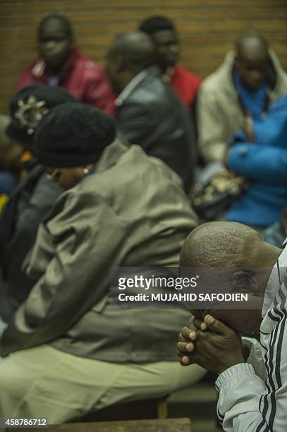 Family members of the suspect accused of Bafana Bafana captain Senzo Meyiwa's murder attend a pre-bail hearing at the Boksburg Magistrate's Court on...