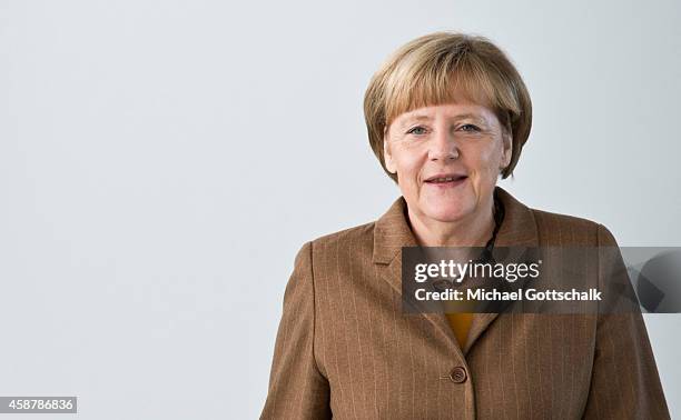 Berlin, Germany German Chancellor Angela Merkel welcomes Bill Gates, Founder of Bill and Melinda Gates foundation , in chancellery on November 11,...