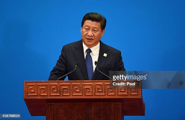 China's President Xi Jinping speaks at the closing press conference of the Asian-Pacific Economy Cooperation Summit outside of Beijing, China. APEC...