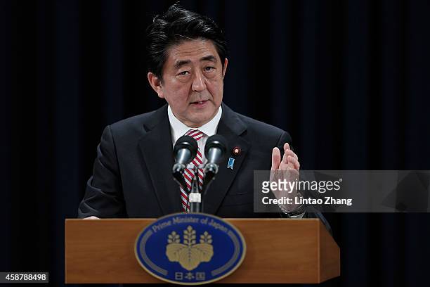Prime Minister of Japan Shinzo Abe speaks during a press conference in the Asia-Pacific Economic Cooperation Summit at Chang Fu Gong hotel on...