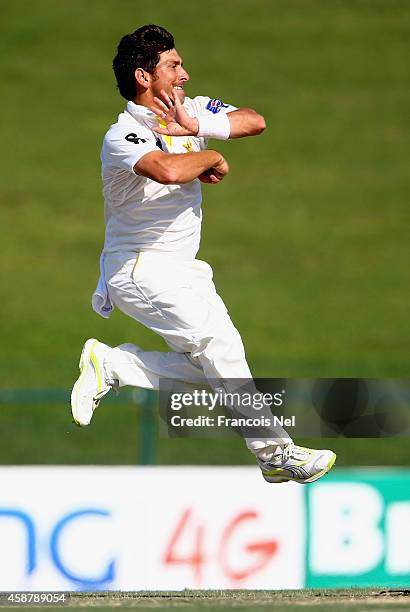 Yasir Shah of Pakistan bowls during Day Three of the First Test between Pakistan and New Zealand at Sheikh Zayed stadium on November 11, 2014 in Abu...