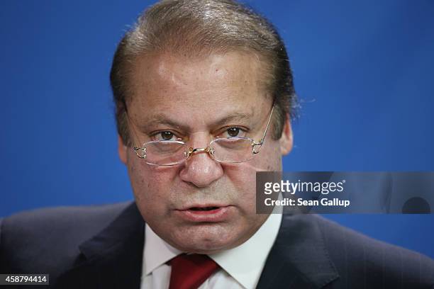 Pakistani Prime Minister Nawaz Sharif speaks to the media with German Chancellor Angela Merkel following talks at the Chancellery on November 11,...