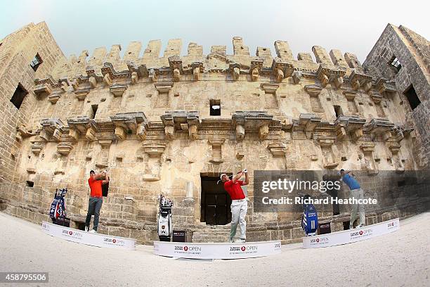 Sergio Garcia of Spain, Henrik Stenson of Sweden and Lee Westwood of England take on the challenge to hit golf balls over the towering walls of the...