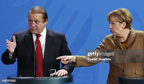 Germany's Chancellor Angela Merkel and Pakistan's Prime Minister Nawaz Sharif hold a joint press release after their meeting at the Prime Ministry...