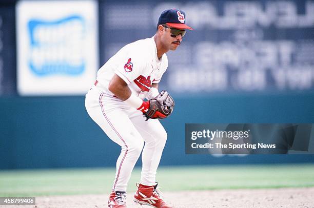 Carlos Baerga of the Cleveland Indians fields against the Texas Rangers at Progressive Field on May 19, 1996 in Cleveland, Ohio.