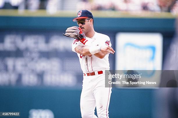 Carlos Baerga of the Cleveland Indians fields against the Texas Rangers at Progressive Field on May 19, 1996 in Cleveland, Ohio.