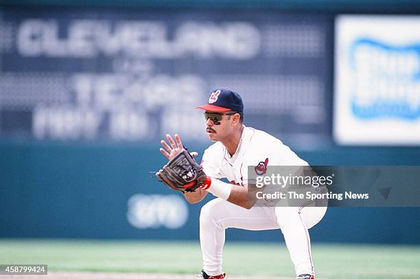 Carlos Baerga of the Cleveland Indians fields against the Texas Rangers at Progressive Field on May 19, 1996 in Cleveland, Ohio.