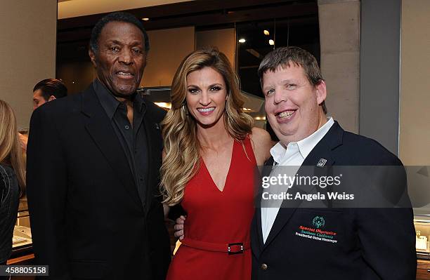 Rafer Johnson, Erin Andrews and Dustin Plunkett attend an in-store event hosted by David Yurman with Jarret Stoll to celebrate the launch of The...