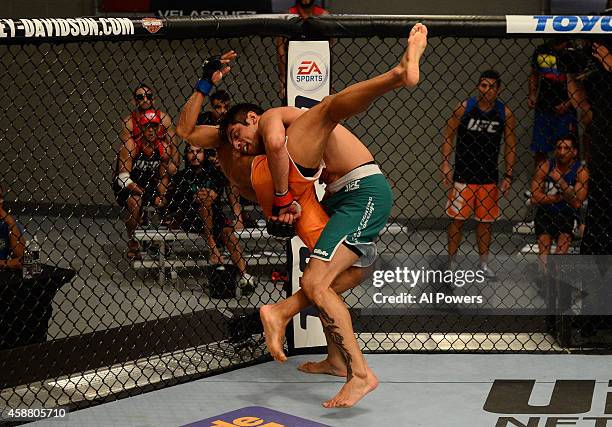 Team Velasquez fighter Gabriel Benitez takes down team Werdum fighter Leonardo Morales in their semifinal fight during filming of The Ultimate...