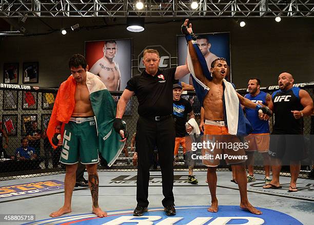 Team Werdum fighter Leonardo Morales celebrates his victory over team Velasquez fighter Gabriel Benitez after their semifinal fight during filming of...