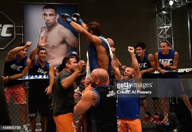 Team Werdum fighter Leonardo Morales celebrates his victory over team Velasquez fighter Gabriel Benitez after their semifinal fight during filming of...