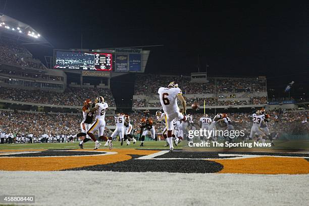 Shaun Suisham of the Washington Redskins punts the ball away during a game against the Cincinnati Bengals on August 13, 2006 at the Paul Brown...