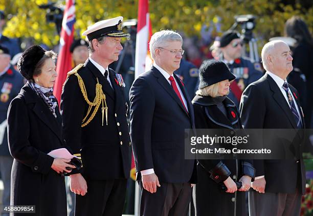Princess Anne and her husband Sir Tim Laurence, Canadian Prime Minister Stephen Harper, his wife, Laureen, and Julian Fantino watch this morning's...