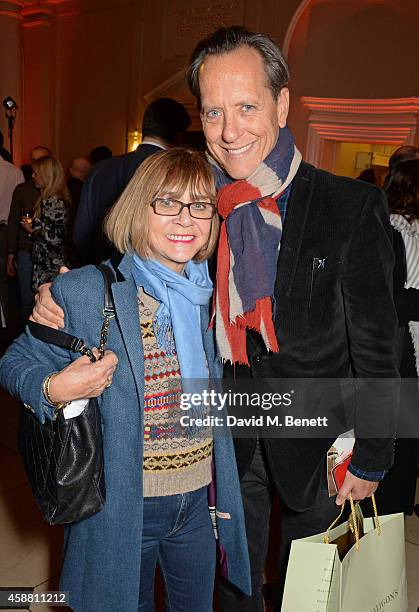 Joan Washington and Richard E. Grant attend the private view of "Wounded: The Legacy of War" at Somerset House on Remembrance Day, November 11, 2014...