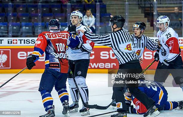 Aaron Gagnon of Lukko Rauma and Otto Karvinen of TPS Turku face off during the Champions Hockey League round of 16 second leg game between Lukko...