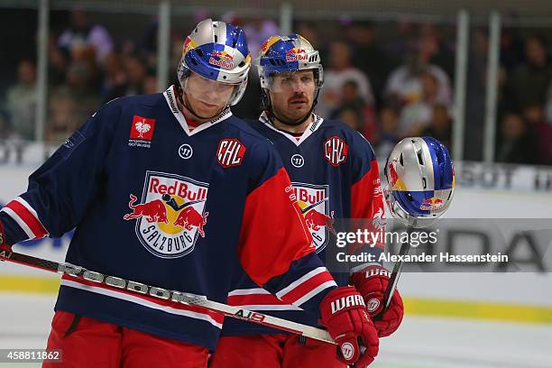 Brian Fahey and Troy Milam of Salzburg react during the Champions Hockey League Play-Off Round of 16 game between Red Bull Salzburg and Lulea Hockey...