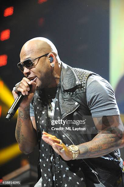 Flo Rida perdorms at Hot 99.5's Jingle Ball 2013 at Verizon Center on December 16, 2013 in Washington, DC.