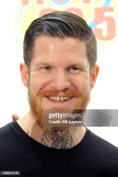 Andy Hurley of Fall Out Boy addresses the media before he performs at Hot 99.5's Jingle Ball 2013 at Verizon Center on December 16, 2013 in...