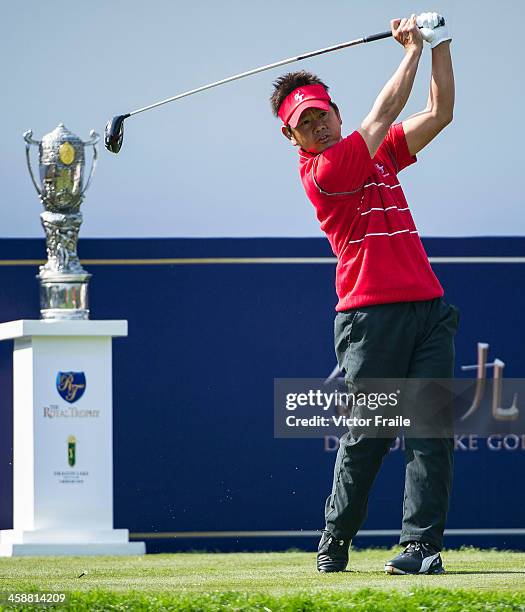 Hiroyuki Fujita of Japan tees off on the 1st tee during the single's match in the Royal Trophy Europe vs Asia Golf Championship at Dragon Lake Golf...