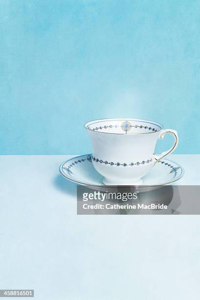 classic blue and white tea cup - catherine macbride stock pictures, royalty-free photos & images