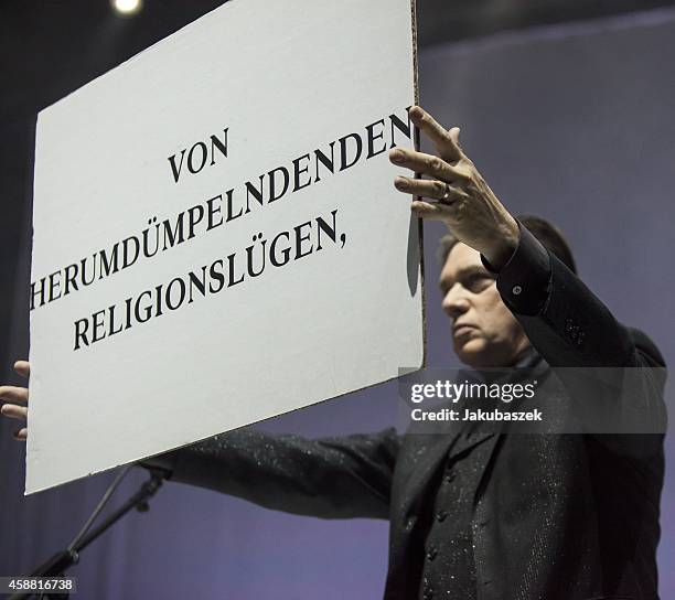 Blixa Bargeld of the German band Einstuerzende Neubauten performs live during a concert at the Tempodrom on November 11, 2014 in Berlin, Germany.