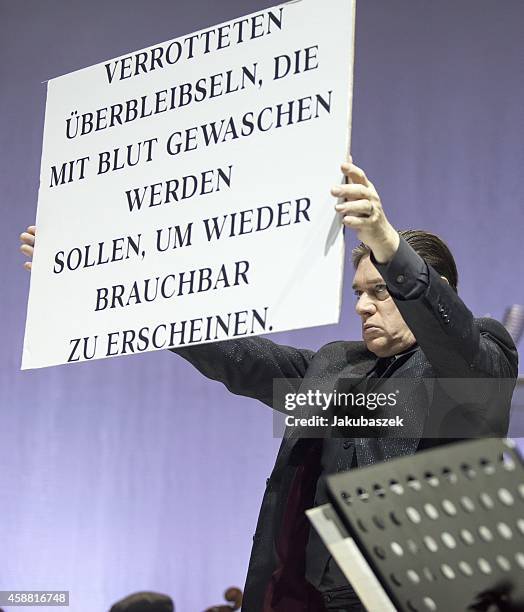 Blixa Bargeld of the German band Einstuerzende Neubauten performs live during a concert at the Tempodrom on November 11, 2014 in Berlin, Germany.