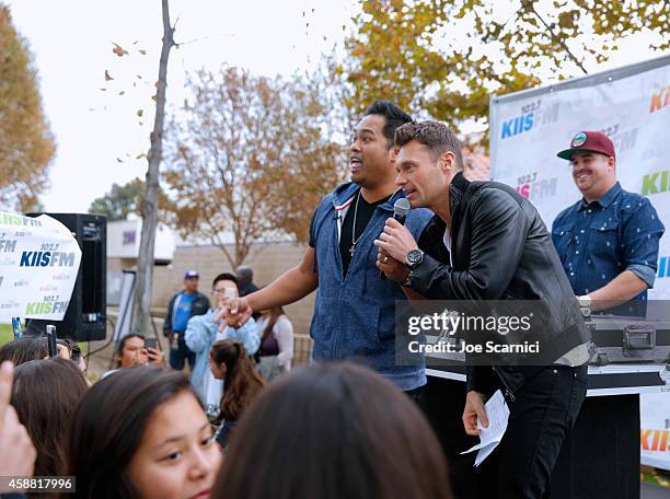 Manny On The Streets, tv personality Ryan Seacrest and DJ Howly onstage during the Ford Drive 4UR School Event with Ryan Seacrest, The Recording...