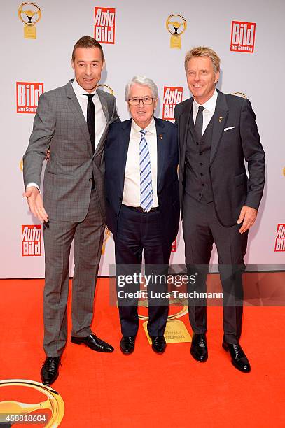 Kai Pflaume; Frank Elstner and Joerg Pilawa attends 'Goldenes Lenkrad' Award 2014 at Axel Springer Haus on November 11, 2014 in Berlin, Germany.