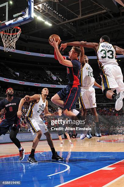 Josh Bostic of the Detroit Pistons goes up for a shot against the Utah Jazz on November 9, 2014 at The Palace of Auburn Hills in Auburn Hills,...