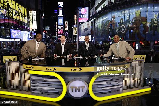 Ernie Johnson, Charles Barkley, Kenny Smith and Shaquille O'Neal of "Inside the NBA" pose for a picture at the TNT tip off event at Times Square...