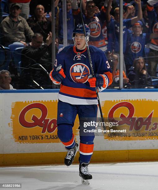 Travis Hamonic of the New York Islanders celebrates his goal at 6:38 of the second period against the Colorado Avalanche at the Nassau Veterans...