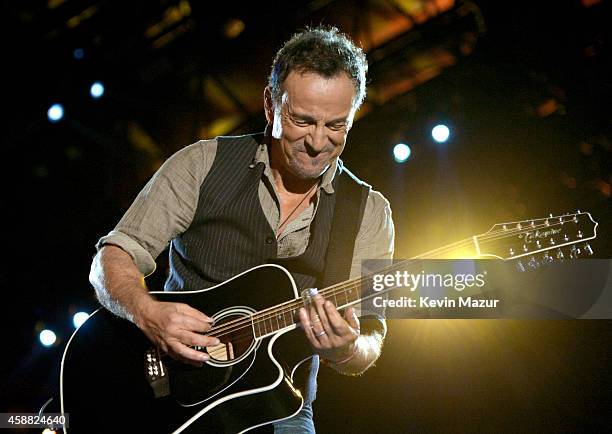 Musician Bruce Springsteen performs onstage during "The Concert For Valor" at The National Mall on November 11, 2014 in Washington, DC.