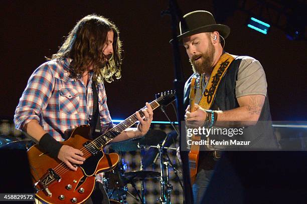 Musicians Dave Grohl and Zac Brown perform onstage during "The Concert For Valor" at The National Mall on November 11, 2014 in Washington, DC.