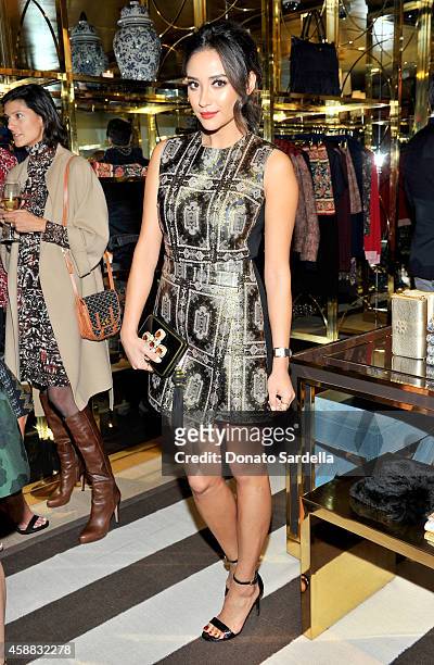 Actress Shay Mitchell attends Vogue and Tory Burch celebrate the Tory Burch Watch Collection at Tory Burch on November 11, 2014 in Beverly Hills,...
