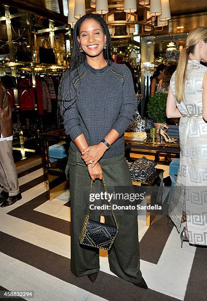 Actress Joy Bryant attends Vogue and Tory Burch celebrate the Tory Burch Watch Collection at Tory Burch on November 11, 2014 in Beverly Hills,...