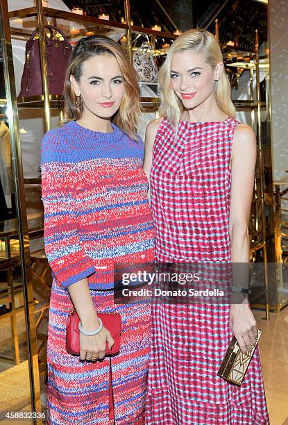 Actress Camilla Belle and model Jaime King attend Vogue and Tory Burch celebrate the Tory Burch Watch Collection at Tory Burch on November 11, 2014...