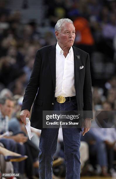 Peter Holt, Chairman and CEO of the San Antonio Spurs, walks to his seat during their game against the Golden State Warriors at ORACLE Arena on...