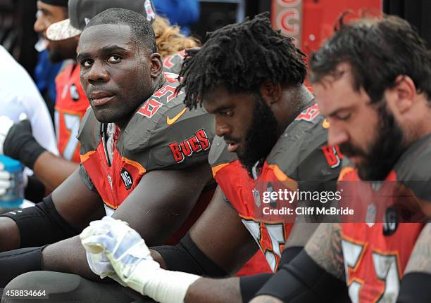 Tackle Demar Dotson of the Tampa Bay Buccaneers sits on the bench against the Atlanta Falcons at Raymond James Stadium on November 9, 2014 in Tampa,...