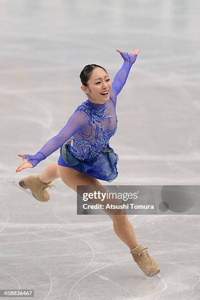 Miki Ando of Japan performs in the Ladie's short program during All Japan Figure Skating Championships at Saitama Super Arena on December 22, 2013 in...