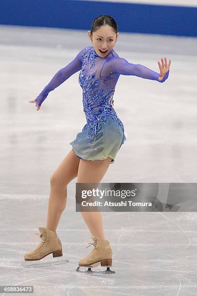 Miki Ando of Japan performs in the Ladie's short program during All Japan Figure Skating Championships at Saitama Super Arena on December 22, 2013 in...