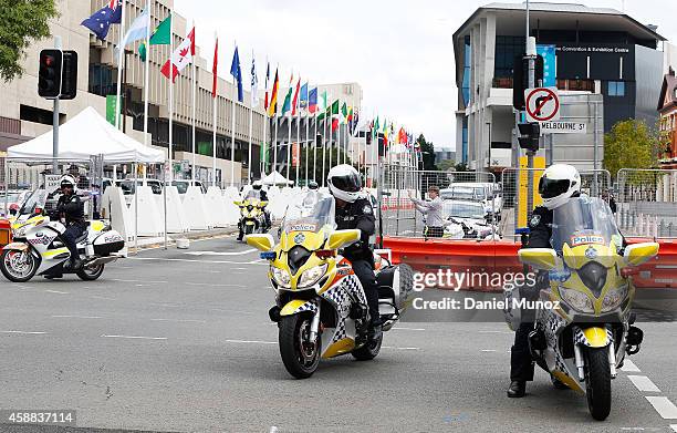 Police officers leave the Brisbane Convention and Exhibition Centre on November 12, 2014 in Brisbane, Australia. World economic leaders will travel...