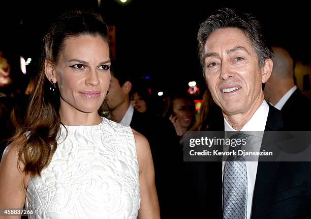 Actress Hilary Swank and Saban Films President Bill Bromiley attend the screening of "The Homesman" during AFI FEST 2014 presented by Audi at Dolby...